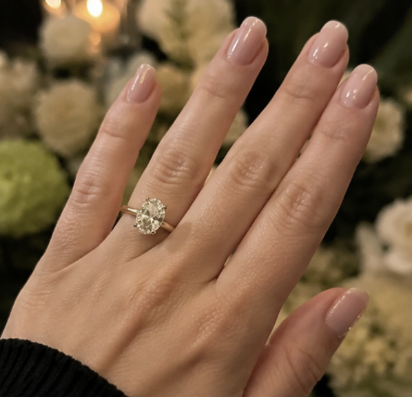A close-up engagement ring photo